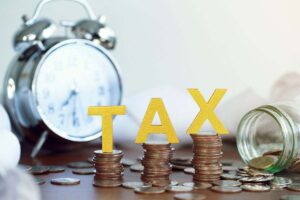 Sveglia, parola Tax e monete