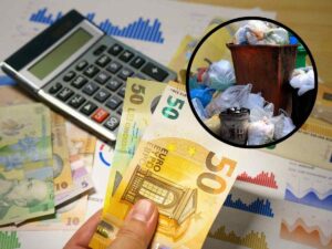 sfondo banconote euro e calcolatrice e tondo con rifiuti